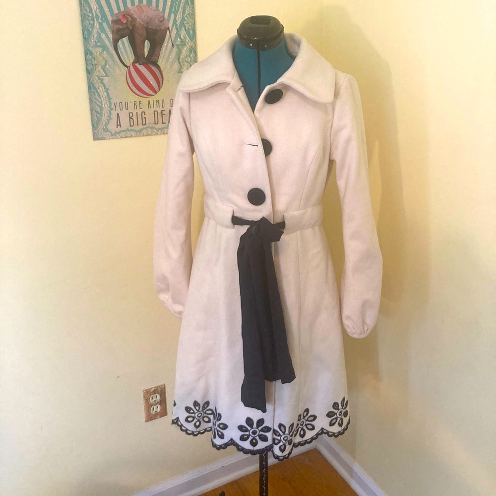 Amazing wool coat with black trim from Liquid